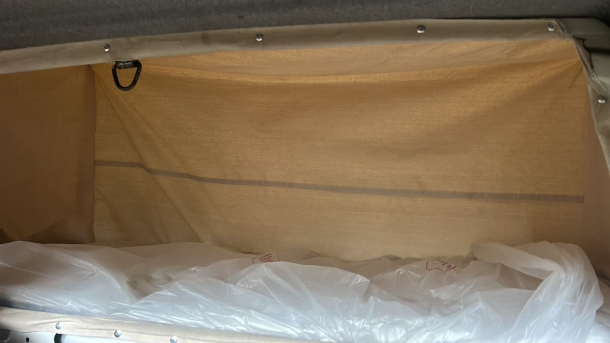 Bed area with canvas cover